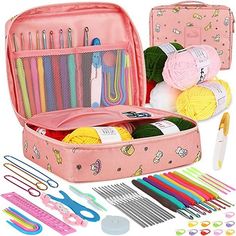 a pink case filled with knitting supplies and crochet hooks