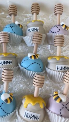 there are many cupcakes that have honey on them and the words humpy written on them