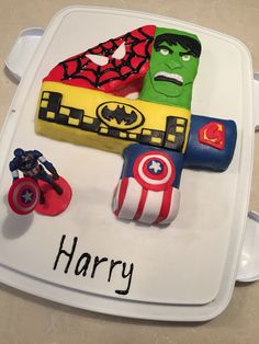 a birthday cake made to look like the avengers