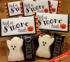 halloween treat bags with white frosting and ghost candies