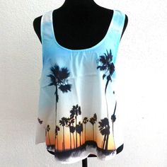 Ella Samani, California Style Palm Trees Tank Top New Without Tags, Never Worn. Label: Ella Samani Size: L Material: 100% Polyester, Made In Usa Measurement About: Shoulder 11", Bust 40", Long 22" Cute, Unique Design, Nice For Summer, Beach, Night Club Summer Tropical Print Blue Blouse, Summer Blue Blouse With Tropical Print, Blue Tropical Print Blouse For Summer, Blue Printed Tank Top For Summer, Blue Palm Tree Print Tops For Beach Season, Blue Vacation Top With Palm Tree Print, Blue Palm Tree Print Top For Vacation, White Printed Tank Top For The Beach, Blue Tropical Print Blouse For Beach