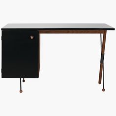 a black desk with a wooden top and metal legs