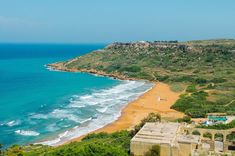 an aerial view of the beach and ocean