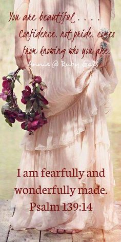 a woman in a white dress holding flowers with the words, i am fearlessly and wonderfully made