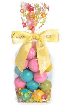 a bag filled with lots of colorful eggs