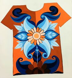 an orange shirt with blue and white flowers on it