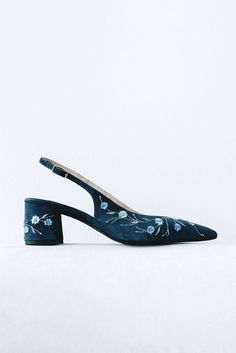 Wedding slingback pumps 'Tati' are handcrafted from navy blue Italian suede. The pair of bridal heels features handmade floral embroidery with flowers and vines that can be customized to your preference.  This design also has pointy toes and a 5.5 cm / 2.2 inches stable block heel. The heel also has the embroidery on all sides in the same pattern. These wedding shoes are designed with a V-notched vamp (v-cut) and closed toe which makes bridal sandals even more elegant and special. Take note that Elegant Formal Heels With Floral Embroidery, Elegant Floral Embroidered Heels For Formal Occasions, Elegant Floral Embroidery Heels For Formal Occasions, Evening Heels With Floral Embroidery And Closed Toe, Floral Embroidered Heels For Evening With Closed Toe, Evening Heels With Floral Embroidery And Pointed Toe, Formal Heels With Floral Embroidery And Pointed Toe, Formal Heels With Floral Embroidery And Ankle Strap, Formal Floral Embroidered Pointed Toe Heels