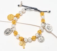 A beautiful symbol of faith, this two-tone charm bracelet showcases the saints in such a stunning way. From My Saint My Hero. Hero Bracelet, Blessed Family, Beautiful Symbols, The Saints, My Hero, Metal Beads, Bracelet Set, Two Tone, Silver Tone