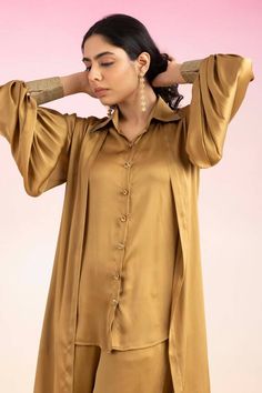 Honey gold shrug with cutdana embroidery on cuff sleeve hem. Paired with collar embroidered shirt and flared pant. - Aza Fashions Elegant Long Sleeve Kurta With Button Cuffs, Gold Long Sleeve Tops With Button Cuffs, Festive Long Sleeve Blouse With Embroidered Cuffs, Elegant Straight Kurta Top For Designer Wear, Elegant Designer Wear Straight Kurta Top, Silk Sets With Embroidered Sleeves And Long Sleeve, Elegant Designer Long Sleeve Tops, Elegant Long Sleeve Designer Tops, Elegant Long Sleeve Sets With Embroidered Cuffs