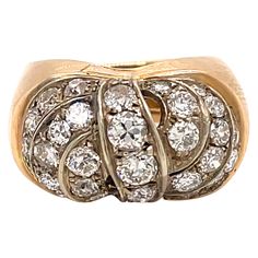 An Authentic Retro ring, original from 1940, made in Italy, mounted in 18k yellow gold. The ring has a wide, textured band comprised of ridged grooves that travel around the entire outer surface, in the center there are five vertical rows of large sparkling and white old mine cut diamonds, total weighing 2.80 carat. H/I color Vs clarity. Total weight: 8 gr Size: IT 15 - FR 55 - US 7,5 - UK O - This ring may be professionally adjusted in size on request to meet your personal requirements, free of Diamond Dress Ring, Retro 3, Diamond Dress, Retro Ring, Gold Cocktail Ring, Gold Cocktail, Dress Rings, Diamond Gold, Cocktail Ring