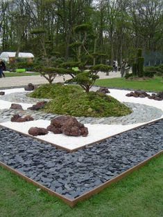 a rock garden in the middle of a park