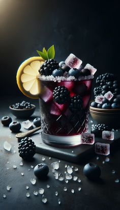 a glass filled with ice and berries on top of a table