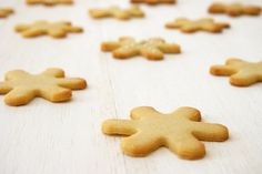 some cookies are arranged on a white table