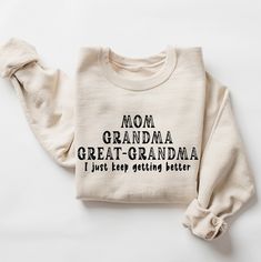 Mom Grandma Great Grandma Sweatshirt, Grandma Shirt, Pregnancy Announcement Sweater, Great Grandma Gift, Mother's Day Gift, Grandma Sweater BLACK TEXT is used for Yellow, Heather Peach, White, Light Gray, Mint Shirts. Other colored shirts have white text. F I T ∙ & ∙ S I Z I N G : -->These Unisex T-shirts have a modern-fit, consult size chart in pics for accurate fit -->Women's sizes are narrower than the waist -->Sleeves are rolled up in some product pictures, they do not come rolled up on deli Mom Grandma Great Grandma, Baby Announcement Shirt, New Grandparent Gifts, Mint Shirt, Funny Pregnancy Shirts, Baby Announcement Shirts, Grandma Sweatshirt, Great Grandma Gifts, Funny Pregnancy