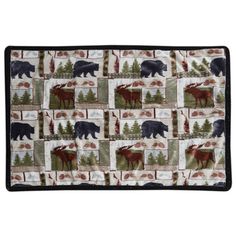 a rug with moose and bear images on it