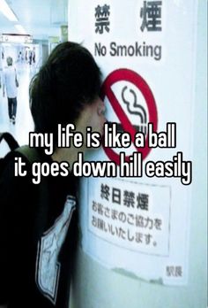 a person leaning against a sign with the words my life is like a ball it goes down hill easily