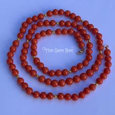 DESCRIPTION: Thank you for coming in! Classic 18K solid gold necklace with Sardinia Coral sphere beads from the Mediterranean, no dye, 100% natural color. You'll get the necklace you see! SIZE of coral: Appr. 6.6mm-7.5mm Weight: 40.32grams MATERIAL: 18k Solid gold, salmon coral Luxury Pearl Necklace With Round Gemstone Beads, Elegant Round Jewelry With 108 Beads, Luxury Single Strand Round Beaded Necklace, Formal Single Strand Red Coral Necklace, Elegant Red Coral Jewelry With 8mm Beads, Elegant Red Coral Gemstone Necklace, Elegant Red Coral Necklaces With Polished Beads, Luxury Hand-strung Beaded Necklace With Round Beads, Elegant Orange Necklaces With Polished Beads