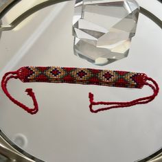 Red Multicolor Beaded Friendship Bracelet New Without Tags! Handmade Adjustable Red Choker, Adjustable Handmade Red Choker, Red Adjustable Casual Beaded Bracelets, Casual Adjustable Red Beaded Bracelets, Casual Red Adjustable Beaded Bracelets, Casual Red Hand-strung Bracelets, Adjustable Red Bead Bangle, Adjustable Red Beaded Bracelet, Traditional Red Friendship Bracelets With Colorful Beads