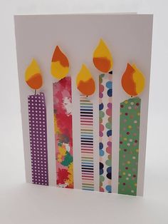 a birthday card with candles on it