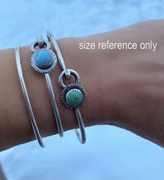 Rustic turquoise sterling silver bangle bracelet 8mm American mined Kingman turquoise is set in pure silver supported by a 2.6mm round (10 gauge) rustic textured sterling bangle with spring closure. This bangle is meant to fit close to the wrist. ♥ This bangle is made to order. The stones will vary slightly from the listing pictures. ♥ PLEASE measure your wrist with a soft tape measure or string at the smallest part (between your hand and wrist bone). Select that measurement from the DROP DOWN M Bohemian Nickel-free Bangle, Handmade Bohemian Sterling Silver Bangle Bracelet, Handmade Bohemian Sterling Silver Bangle, Nickel Free Bohemian Cuff Bracelet, Bohemian Stackable Bangle Cuff Bracelet, Bohemian Sterling Silver Cuff Bracelet, Bohemian Sterling Silver Turquoise Bracelet, Bohemian Stamped 925 Bracelet Gift, Bohemian Stackable Bangle Jewelry