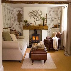 a living room filled with furniture and a fire place