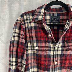 Red, Navy Blue, And Cream Flannel From American Eagle Is Like New, Never Worn. Featuring Chest Pockets, Button Down Front, And Buttoned Sleeves. 100% Cotton. Casual Plaid Flannel Shirt With Buttons, Red Long Sleeve Flannel Shirt With Buttons, Red Flannel Shirt With Buttons, Red Flannel Shirt With Button Closure, Casual Red Flannel Shirt With Buttons, Red Flannel Collared Shirt, Casual Red Flannel Shirt, Red Collared Flannel Shirt With Buttons, Collared Flannel Shirt With Buttons