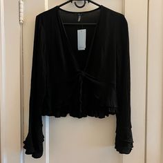 Soprano Black Long Sleeve Front Tie Top Ruffled Sleeves And Bottom Cropped In The Front Women’s Us Medium Brand New With Tags! Can Wear Alone Or As A Cover Up! Black Casual Viscose Tops, Casual Black Viscose Tops, Fitted Black Viscose Top, Fall Party Tops In Viscose, Black Viscose Top For Spring, Black Viscose Tops For Spring, Black Viscose Blouse For Night Out, Spring Black Viscose Blouse, Black Viscose Blouse For Spring