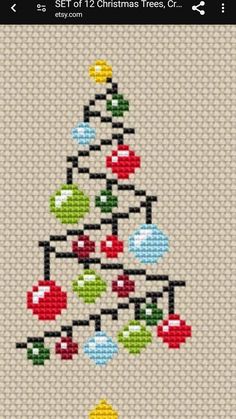 a cross stitch christmas tree with ornaments on it