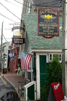 a sign on the side of a building that says salt water cafe and coffee house