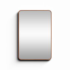 a square mirror on the wall with a wooden frame and metal trim around it's edge