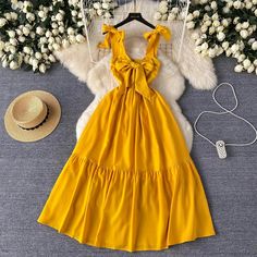 Summer Yellow Womens Dress with Bow Tie Straps Sleeveless Beach Dress With Bow, Beach Sleeveless Dress With Bow, Summer Dress With Bow Detail, Solid Summer Dress With Bow Detail, Casual Summer Dress With Bow, Solid Dress With Tie Straps For Summer, Summer Dress With Tie Straps In Solid Color, Yellow Tie-back Dress For Vacation, Summer Dresses With Tie Straps In Solid Color