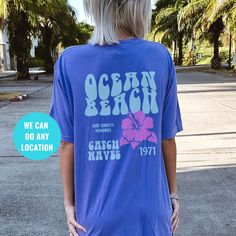 "Siesta beach shirt, Beach tshirt, Aesthetic clothes, y2k clothing, Preppy clothes, Trendy tshirt Trendy shirts: https://etsy.me/3MywvSr Trending sweatshirt: https://etsy.me/3iSkkmg Vacation shirts: https://etsy.me/3BcsHPQ 💡 HOW TO PLACE YOUR ORDER: 1. Please Check and Review all the Photos 2. Select your Shirt Color and Size from drop down menu 3. Choose your Quantity as much as you want 4. Click \"Add To Cart\". You can go back to add more of your favorite items 5. Click \"Proceed to Check Ou Vsco Style Graphic Print T-shirt For Vacation, Beach T-shirt With Sublimation Print, Custom Print T-shirt For Beach Vacation, Blue Summer T-shirt For Surfing, Trendy Beach Vacation Shirt, Beach Shirt With Graphic Print And Relaxed Fit, Beach Party Short Sleeve Shirt, Y2k T-shirt With Sublimation Print For Summer, Short Sleeve Shirt For Beach Party