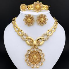 Afraic Jewelry -Jewelry Sets For Women Rhinestone Jewelry Large Pendant Necklace Set Flower Earrings product name: latest jewelry set designs for women postage: Free Shipping plating Color: Gold Plated material: alloy Style: TRENDY Shape\pattern: Flower Origin: Mainland China Occasion: wedding Model Number: 240 Metals Type: Zinc alloy Material: Metal Jewelry Sets Type: Necklace/Earrings/Ring/Bracelet Item Type: Jewelry Sets Included Additional Item Description: Necklace Earrings Bracelet Ring Se Melon Seeds, Large Pendant Necklace, Jewelry Set Design, Set Designs, Color Jewelry, Earrings Ring, Bracelet Ring, Women Necklace, African Beads