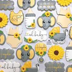 baby shower cookies decorated with sunflowers and elephants