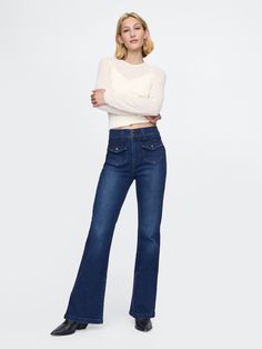 Fit: Snug & flattering through the hip & thigh with a flared leg. ​ Fabric: 86% Cotton, 13% Recycled Materials, 1% Stretch.  Stretch: High Stretch Jeans.  Innovative stretch with high recovery.  Made to move & always bounces back. ​ Rise: High Rise Jeans.  Look: A four-pocket jean in dark indigo wash.  Details: Zip fly with button-flap patch pockets at front & back.  Responsibly Made: This pair of jeans is part of our water-saving Washwell program.  Compared to conventional wash methods, Washwel Womens Lucky Jeans, Jeans Look, Water Saving, Dark Indigo, Petite Jeans, Pocket Jeans, High Rise Jeans, Petite Size, Stretch Jeans