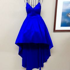 This Dress Is A Beautiful Cobalt Blue And Is A High Low Style. Measures 51 Inches For The Back And 26 Inches Long Kn The Front Front He Breast To The Bottom. Royal Blue Floor-length Cocktail Dress, Royal Blue Knee-length Mini Dress For Party, Royal Blue V-neck Party Midi Dress, Royal Blue Cocktail, Royal Blue A-line Mini Dress For Party, Elegant Royal Blue V-neck Midi Dress, Royal Blue Cocktail Dress, Blue Cocktail Dress, Dream Clothes