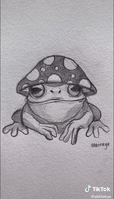 a drawing of a frog with a mushroom on it's head