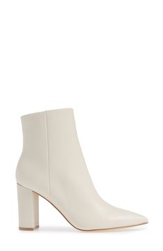 A curved, half-moon heel elevates a sleek and striking bootie crafted from supple leather in a pointy-toe silhouette. 3 1/4" heel (size 8.5) 5" shaft Side zip closure Cushioned footbed Leather upper/synthetic lining and sole Imported Women's Shoes White Heeled Boots With Sculpted Heel And Medium Width, Modern White Heeled Boots With Sculpted Heel, Modern White Boots With Sculpted Heel, Formal Cream Boots With Sculpted Heel, Formal White Heeled Boots With Sculpted Heel, White High Ankle Boots With Sculpted Heel, Modern White Heeled Boots For Fall, Formal Cream Boots With Stacked Heel, Cream High Ankle Heeled Boots With Reinforced Heel