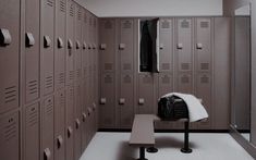 a locker room filled with lots of lockers