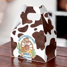 a milk carton shaped like a cow