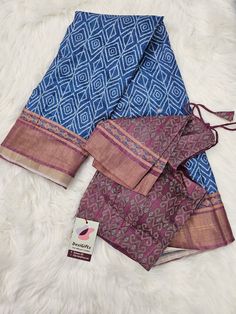 **Visit our store for full collection: https://www.etsy.com/shop/DesiGiftsUSA ** *Saree with Stitched Blouse, Fall & Peeco (Edgeing work) *This Mooga Silk Saree is designed for an elegant and royal and traditional style, perfect for casual formal wear *Fabric : Moonga Silk with Slub Pattern with Zari Border and all over digital print * Color Family: Blue Shade *Occasion: Casual & Festive *Care: dry cleaning *Actual color of the dress may slightly vary due to the screen resolution.  Design SARI# 1317 Disclaimer: Actual color of the dress may slightly vary due to the screen resolution. Feel free to contact us for the size measurements. We are happy to help. **For details on Store policy including return & Exchange, please check our announcement section on the store front.* Blue Bandhani Print Blouse, Blue Bohemian Bandhani Blouse Piece, Blue Block Print Blouse Piece For Festivals, Blue Cotton Blouse Piece With Block Print, Festive Blue Bandhani Print Blouse, Bohemian Blue Handloom Blouse Piece, Blue Bohemian Handloom Blouse Piece, Blue Ikat Print Sets For Festivals, Mens Indian Wear