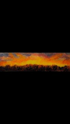 an orange and yellow painting with trees in the background