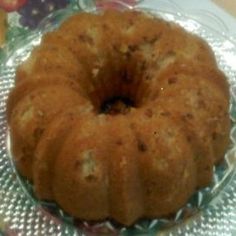 a bundt cake sitting on top of a glass plate