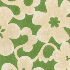 a green and white floral pattern on fabric