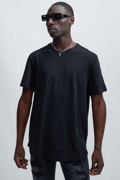 Model Height: 6'4 - Wearing Large Big & Tall: Height 6'5 - Wearing XXXL Available In Black, White, Heather Grey, And Tan. T-Shirt Crew Neck Short Sleeve Scallop Hem 100% Cotton Imported | Mens Essential Basic Scallop Tee Shirt in Black size Large by Fashion Nova Black V-neck T-shirt For Everyday, Black Relaxed Fit V-neck Shirt, Black V-neck Shirt With Relaxed Fit, Black Cotton V-neck T-shirt, Black Cotton V-neck Shirt, Everyday Black Tops With Shirttail Hem, Black Everyday Tops With Shirttail Hem, Black Casual T-shirt With Shirttail Hem, Casual Black T-shirt With Shirttail Hem