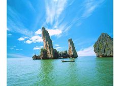 two large rocks sticking out of the water