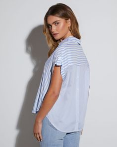 The Kendall Striped Short Sleeve Button Down Top keeps things polished for work and play with classic stripes. It's complete with a collared neckline, short sleeves, and front button closures. Regular fit Collared Short sleeves Striped Front button closures 100% Rayon Striped Short, Striped Shorts, Trending Now, Button Downs, Short Sleeves, Stripes