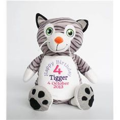 a tiger stuffed animal with the number four on it's chest