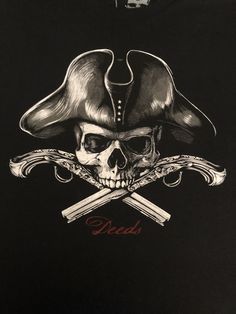 a black shirt with a pirate skull and two crossed swords