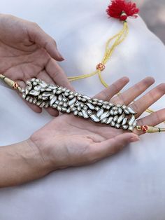 Gold plated silver alloy choker with stone polki. Comes with a traditional Indian dori closure. Uncut Jewellery